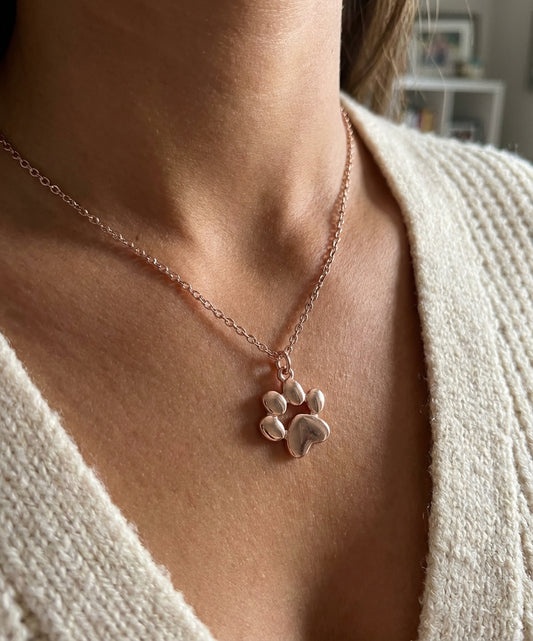 Rose gold paw print pendant